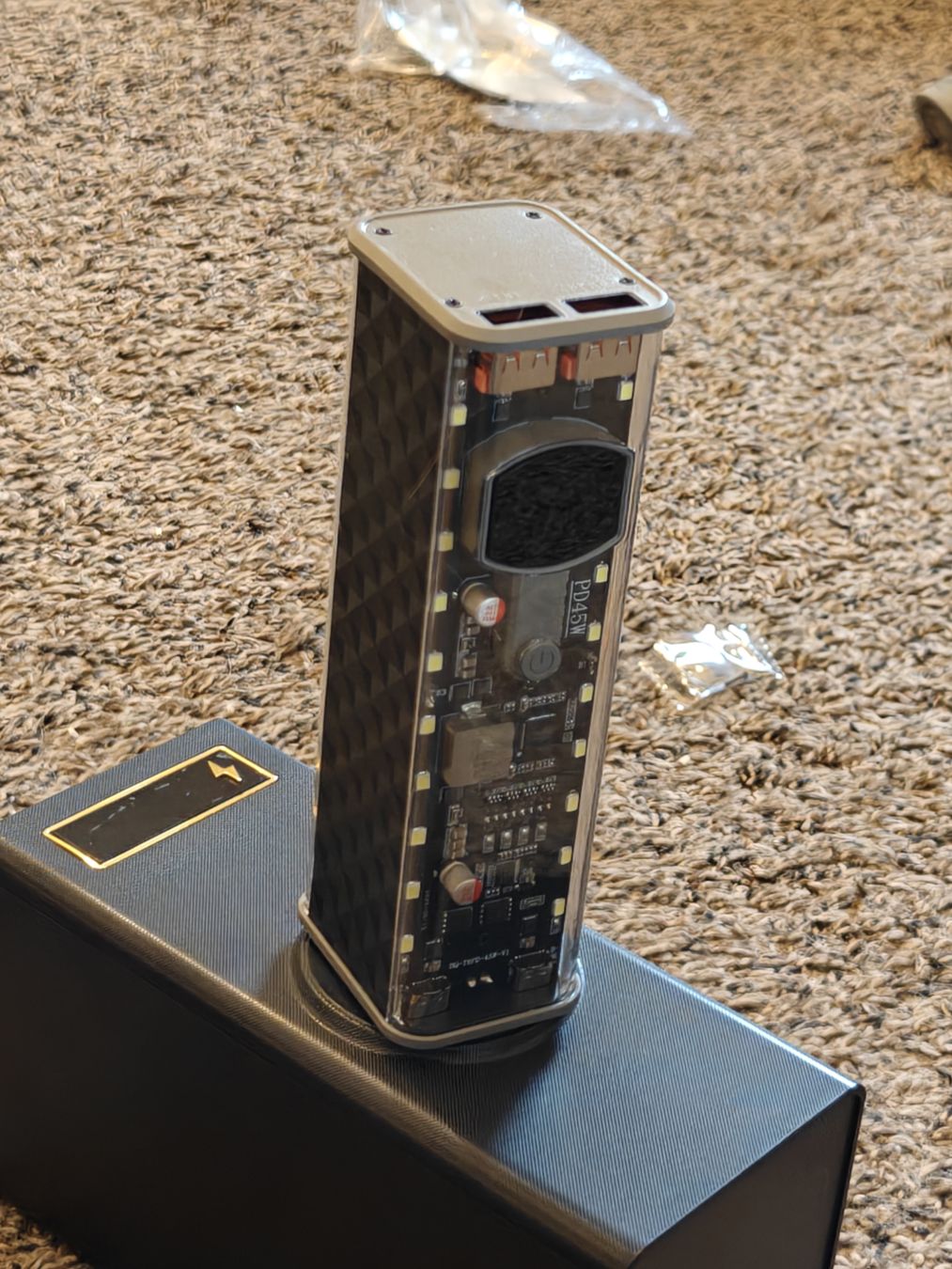 An alternative view of the front of the 8 18650 aliexpress power bank, showing the neat clear design that shows off the circuit board.